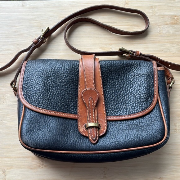 Dooney & Bourke Handbags - Dooney & Bourke Black and Tan Crossbody Bag with Buckle